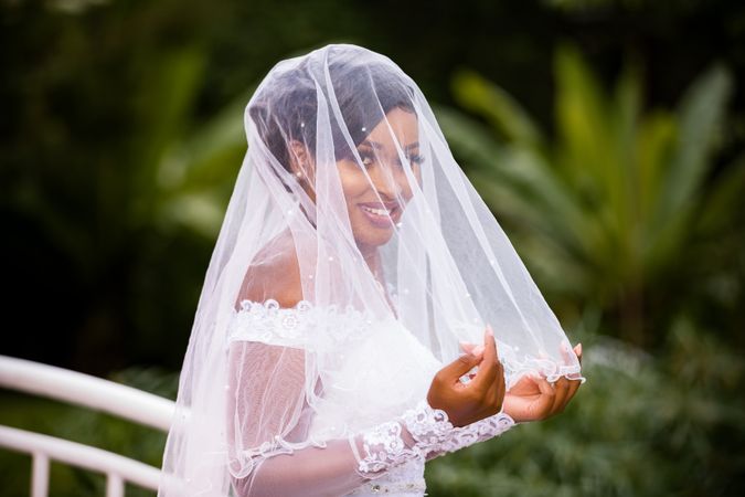 African model posing in wedding dress outdoor