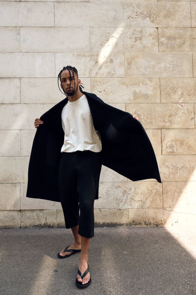 Trendy Black man posing on street