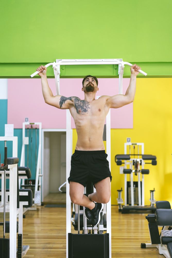 Front of man working out in a fitness club