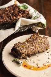 Crispy appetizing cake on plate on wooden surface