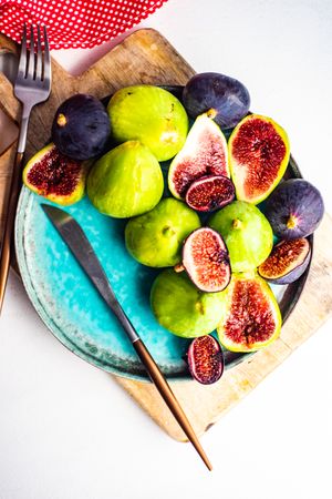 Top view of freshly picked figs on a plate