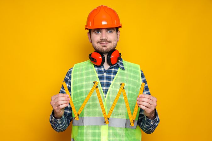 Young man civil engineer in safety hat
