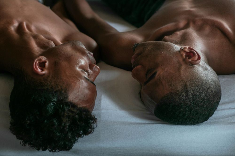 Two men in bed
