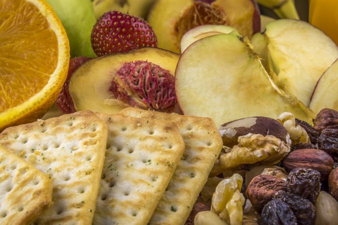 Snacks background fruits nuts crackers