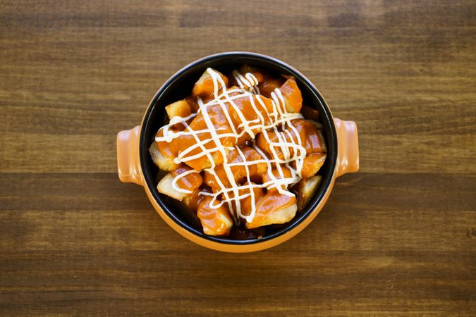 Top view of plate of patatas bravas