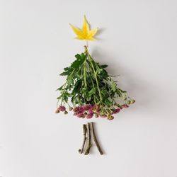 Christmas tree made of leaves and flowers