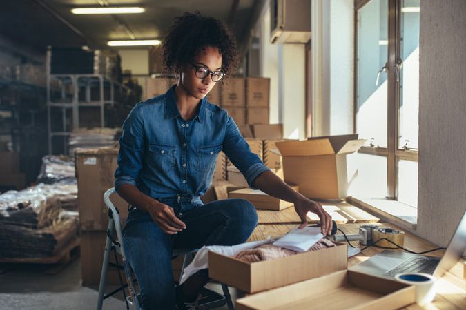 Female entrepreneur packaging box for delivery
