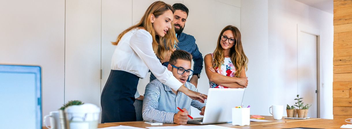 Business people checking project on the laptop