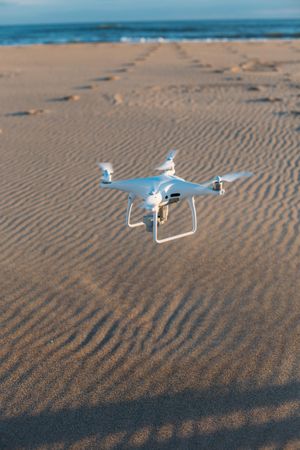 Drone flying over beach