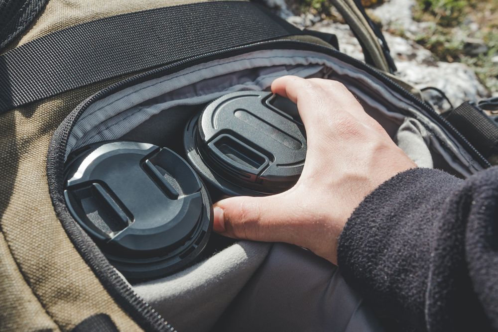 Photographer backpack with lenses