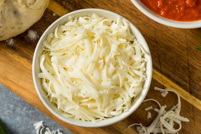 Homemade Shredded Mozzarella Cheese in a Bowl