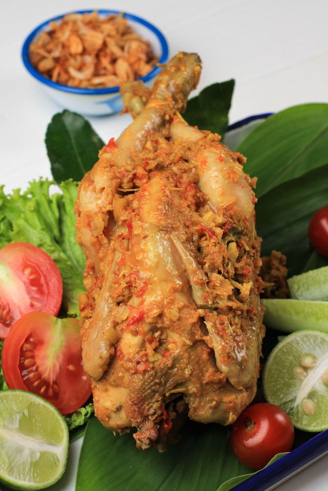 Balinese Roast Chicken Stuffed with Cassava Leaves.
