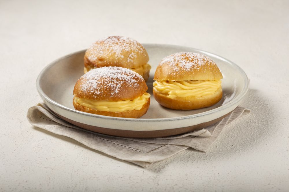 Berlin balls. Bread stuffed with icing cream.