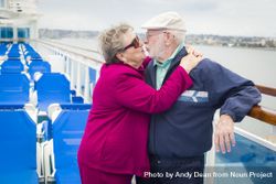 Mature Couple Kissing on Deck of Cruise Ship bDjnpJ