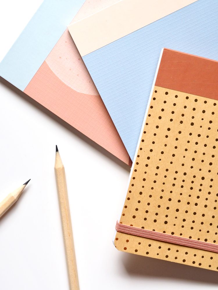 Graphic image of notebooks and pencils