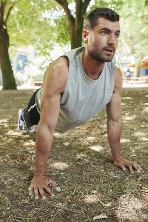 Sporty man training in park
