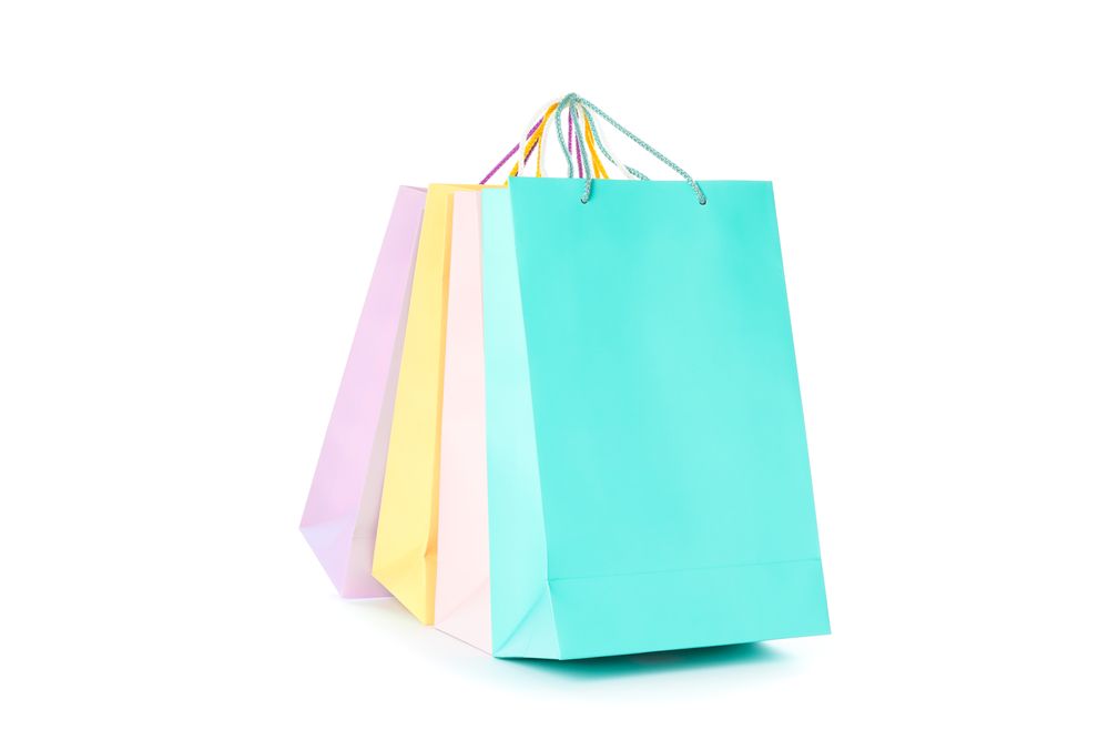 Multicolor paper bags isolated on blank background