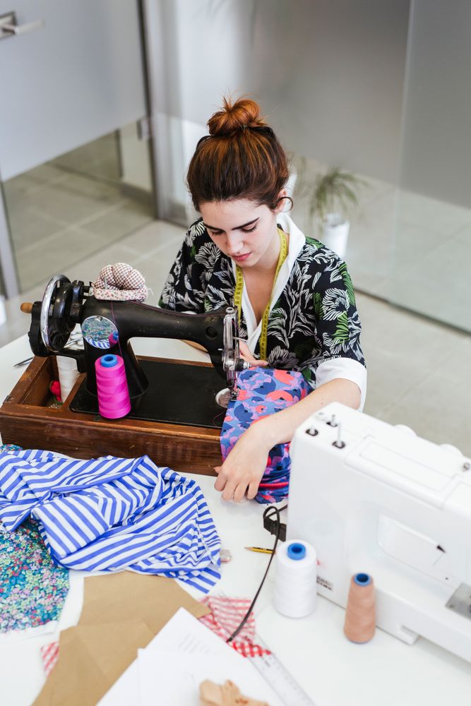 Woman in a sewing school