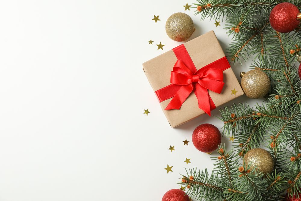 Composition with christmas accessories and tree on blank background, copy space