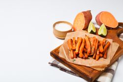 Concept of tasty food - sweet potato fries