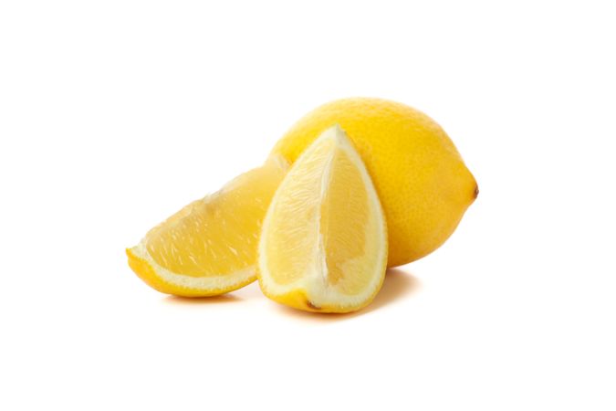 Fresh lemon isolated on light background. Ripe fruit