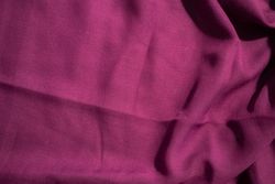Soft purple fabric wavy crumpled background abstract with copy space