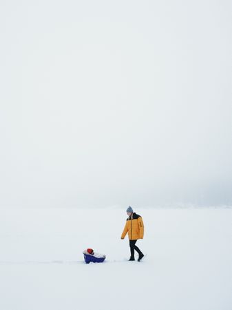 Two people  on snow