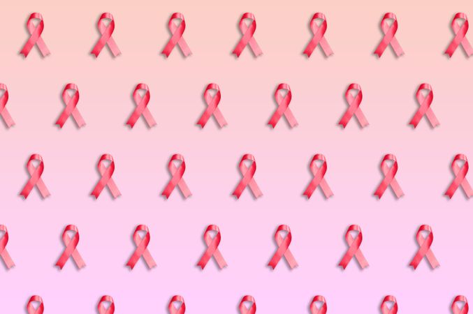 Rows on pink ribbons on pink background