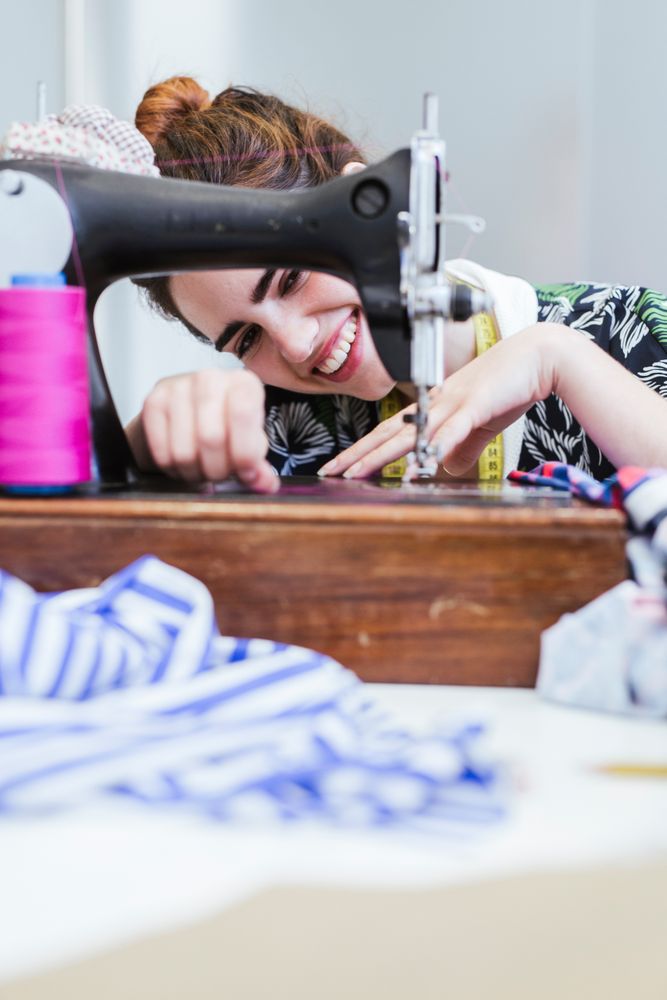 Woman in a sewing school