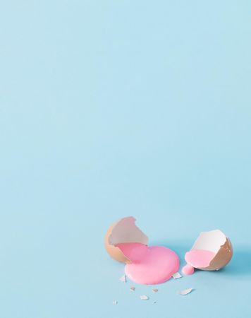 Open eggshell with pastel pink paint
