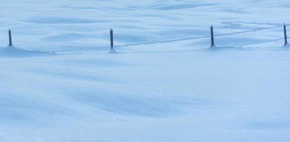 Winter background with a close-up of deep snow in the Bavarian Alps, Germany