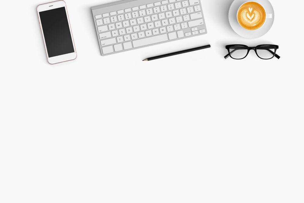 Modern workspace with coffee cup, smartphone and paper copy space