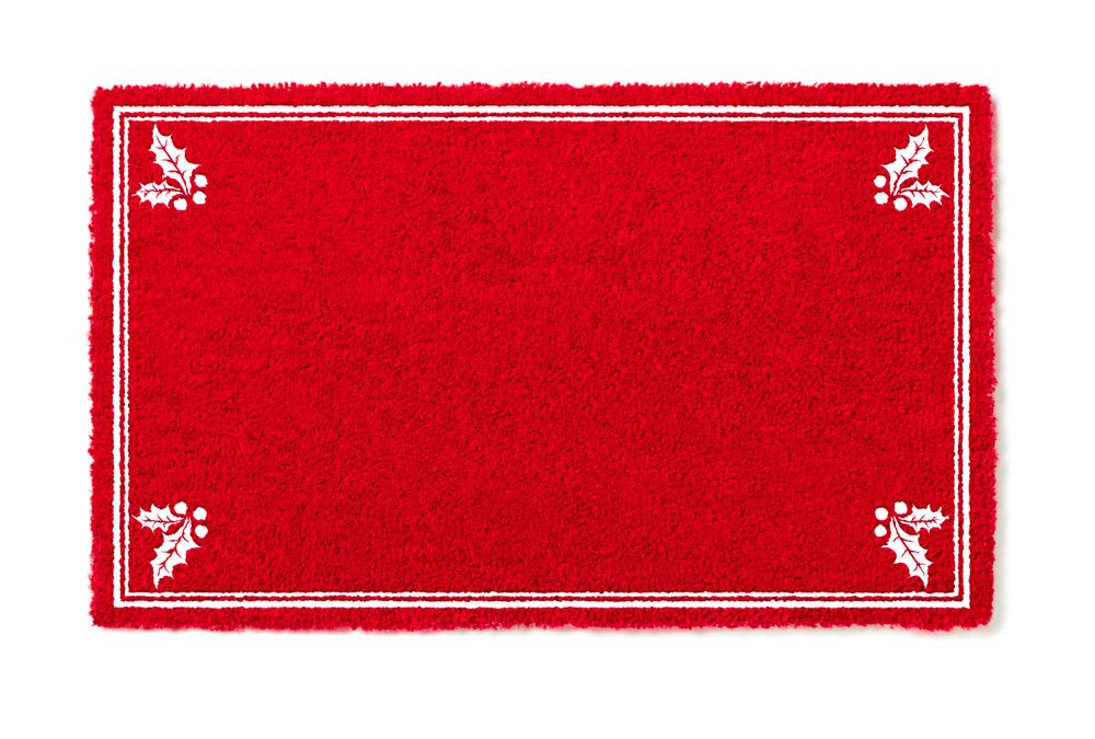 Blank Holiday Red Welcome Mat With Holly Corners Isolated on Background
