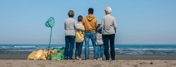 Volunteers backwards watching the sea