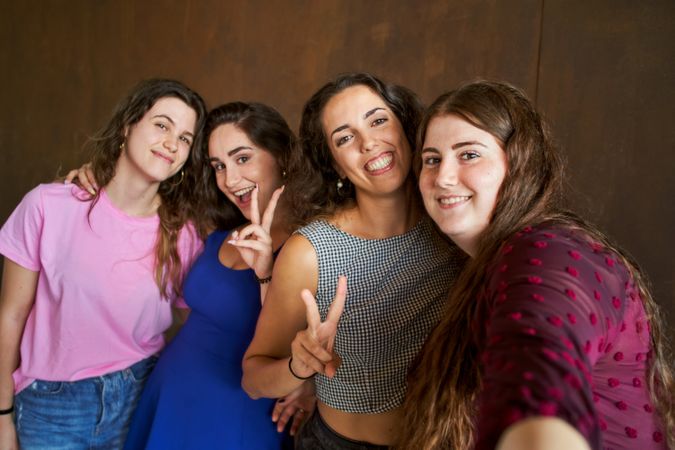 self-portrait of a group of united and happy friends