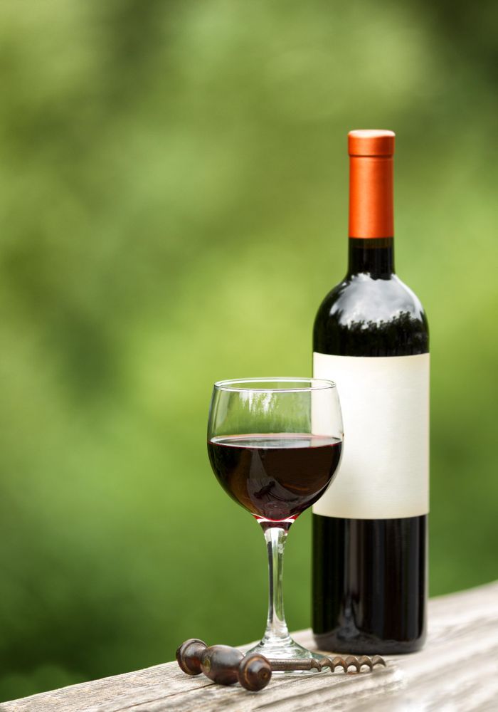 Glass of red wine outdoors ready to enjoy the nice weather