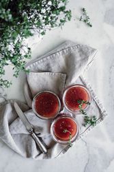 Cans with tomatoes jam on napkin