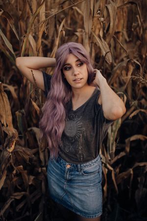 Casual woman in dry vegetation