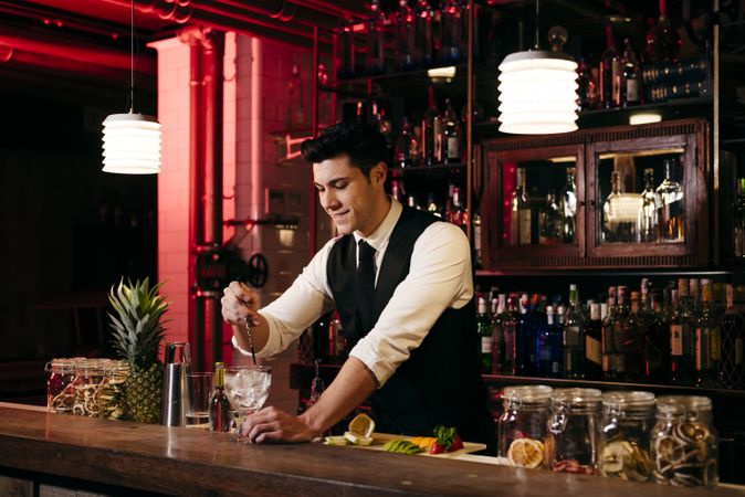 Barman working making drinks