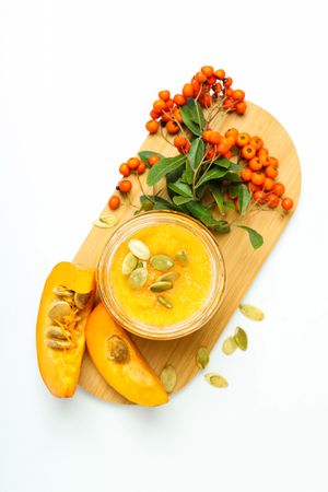 Skin care and face care concept - pumpkin cosmetic