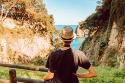 Female tourist contemplating picturesque landscape