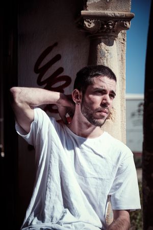 Handsome man in abandoned building