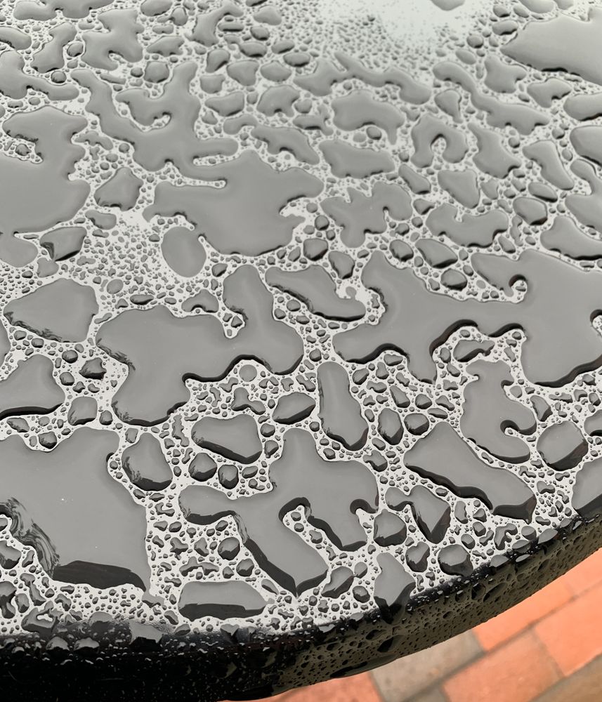 Rain drops on dark table