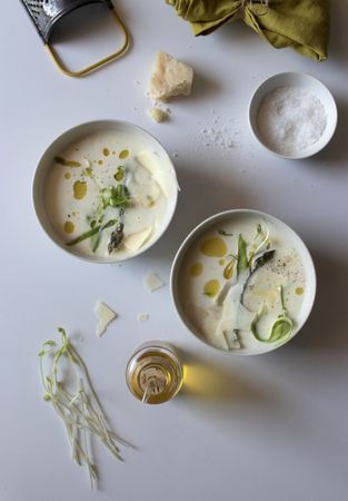 Kitchenware and condiments near asparagus cream soup