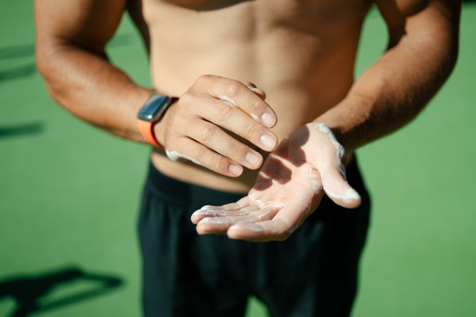 Close-up of a man's hands with magnesium