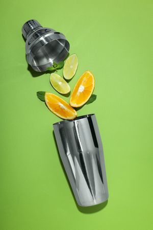 Concept of preparing cocktail, shaker, top view