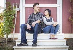 Interracial Couple Relaxing on the Steps