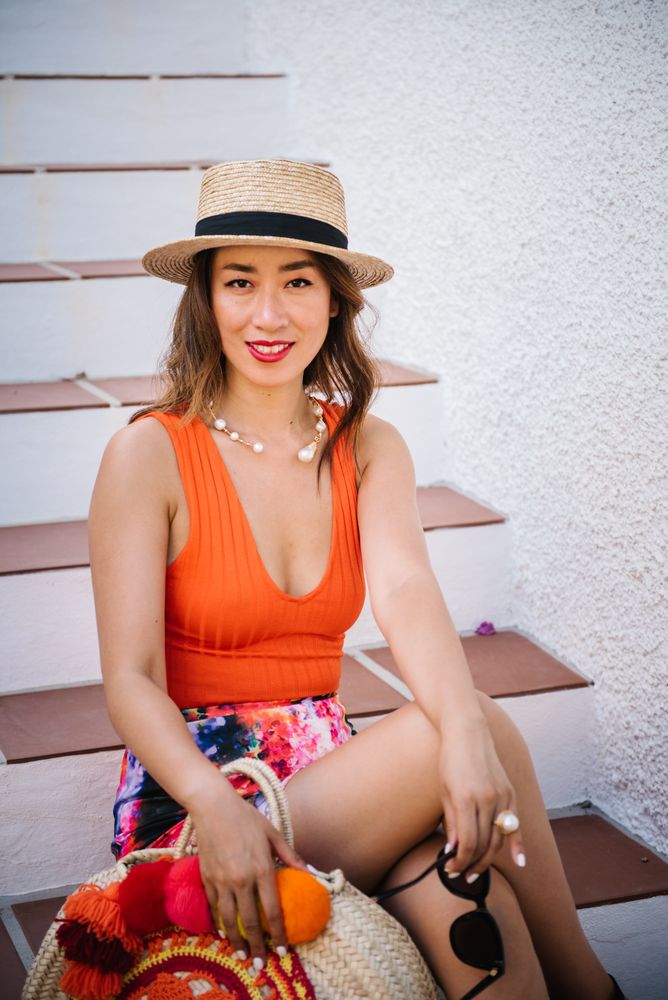 young elegant Chinese woman at mediterranean scenario
