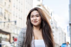Young Asian Woman Posing in the City