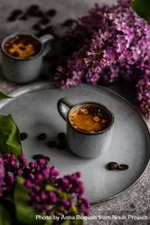 Cup of coffee and lilac flowers 4ZeanO